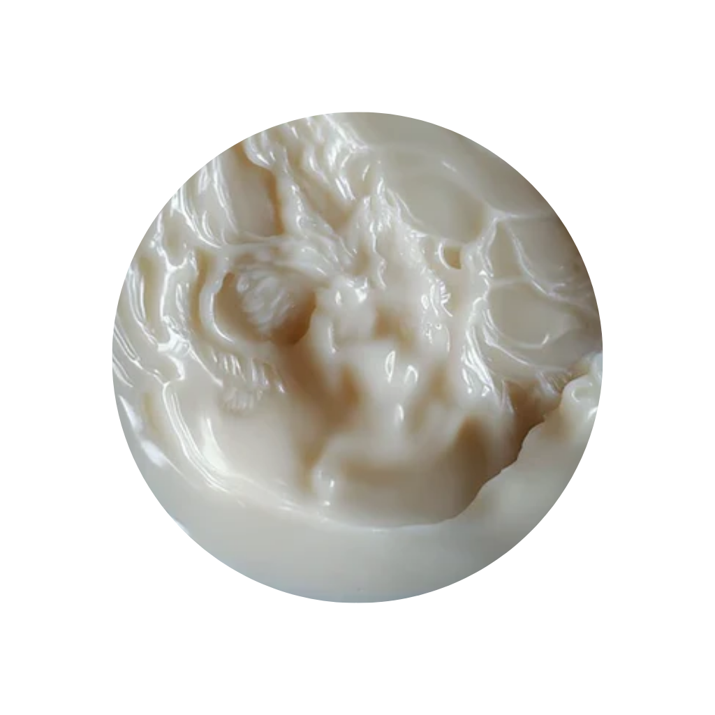 Creamy hand-poured blend of coconut and apricot wax, showcasing a smooth, luxurious texture crafted for a long-lasting, toxin-free, clean burn – Untethered Official.